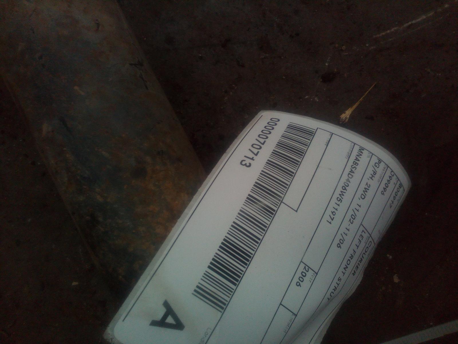 View Auto part Left Front Strut Ford Courier 2006