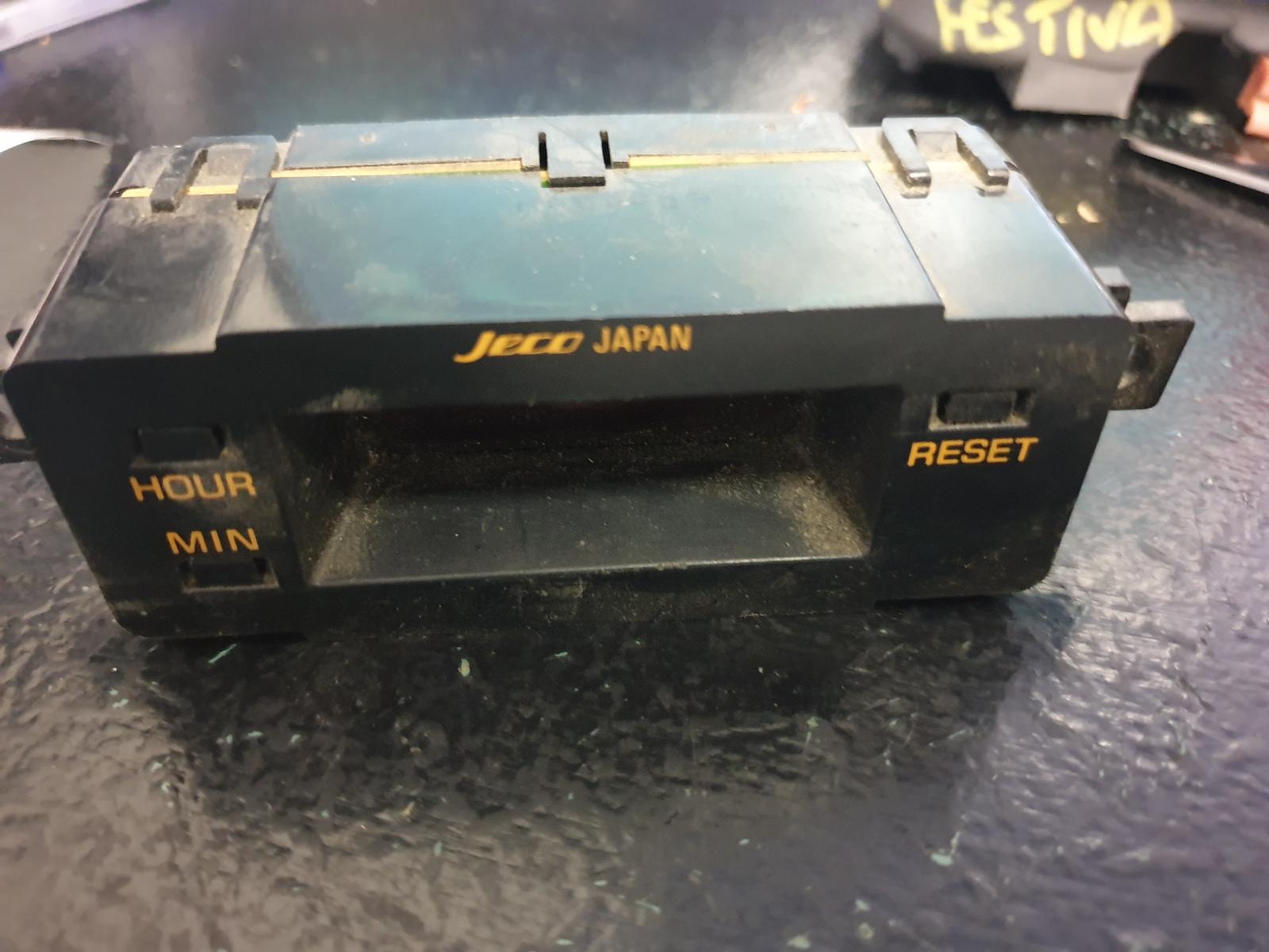 View Auto part Clock Ford Laser 1987