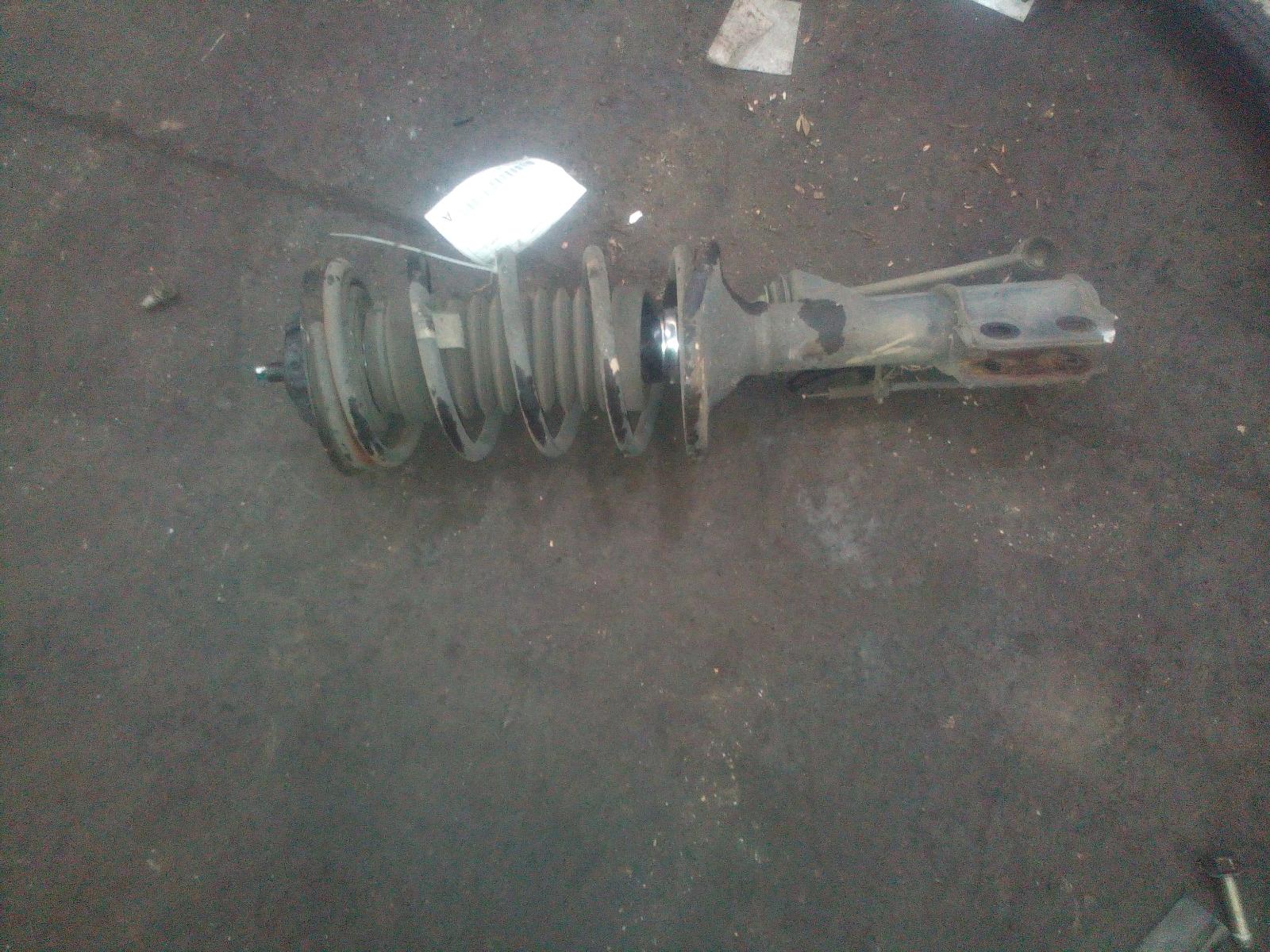 View Auto part Left Front Strut Holden Commodore 2003