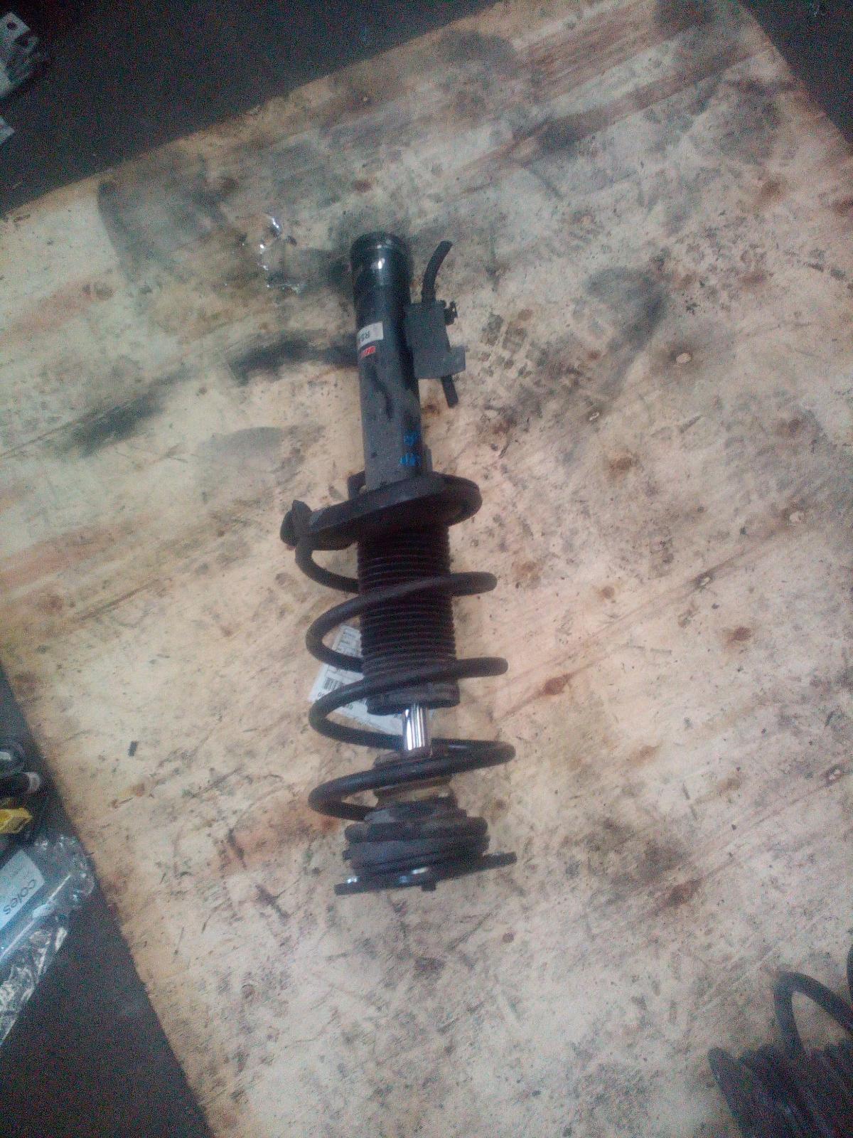 2004 Mazda 3 Left Front Strut View Auto part Left Front Strut Mazda 3 2004