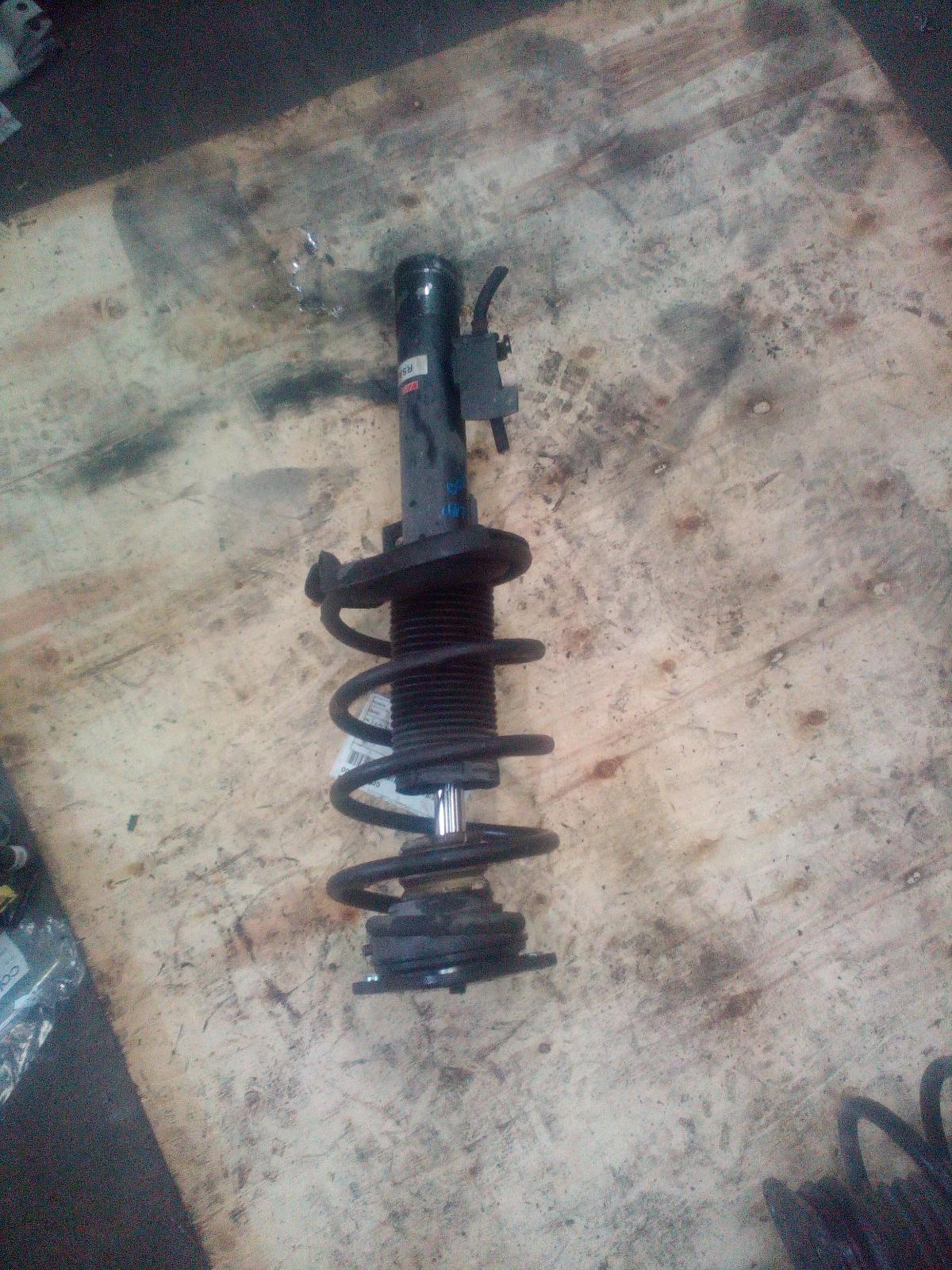 2004 Mazda 3 Left Front Strut View Auto part Left Front Strut Mazda 3 2004