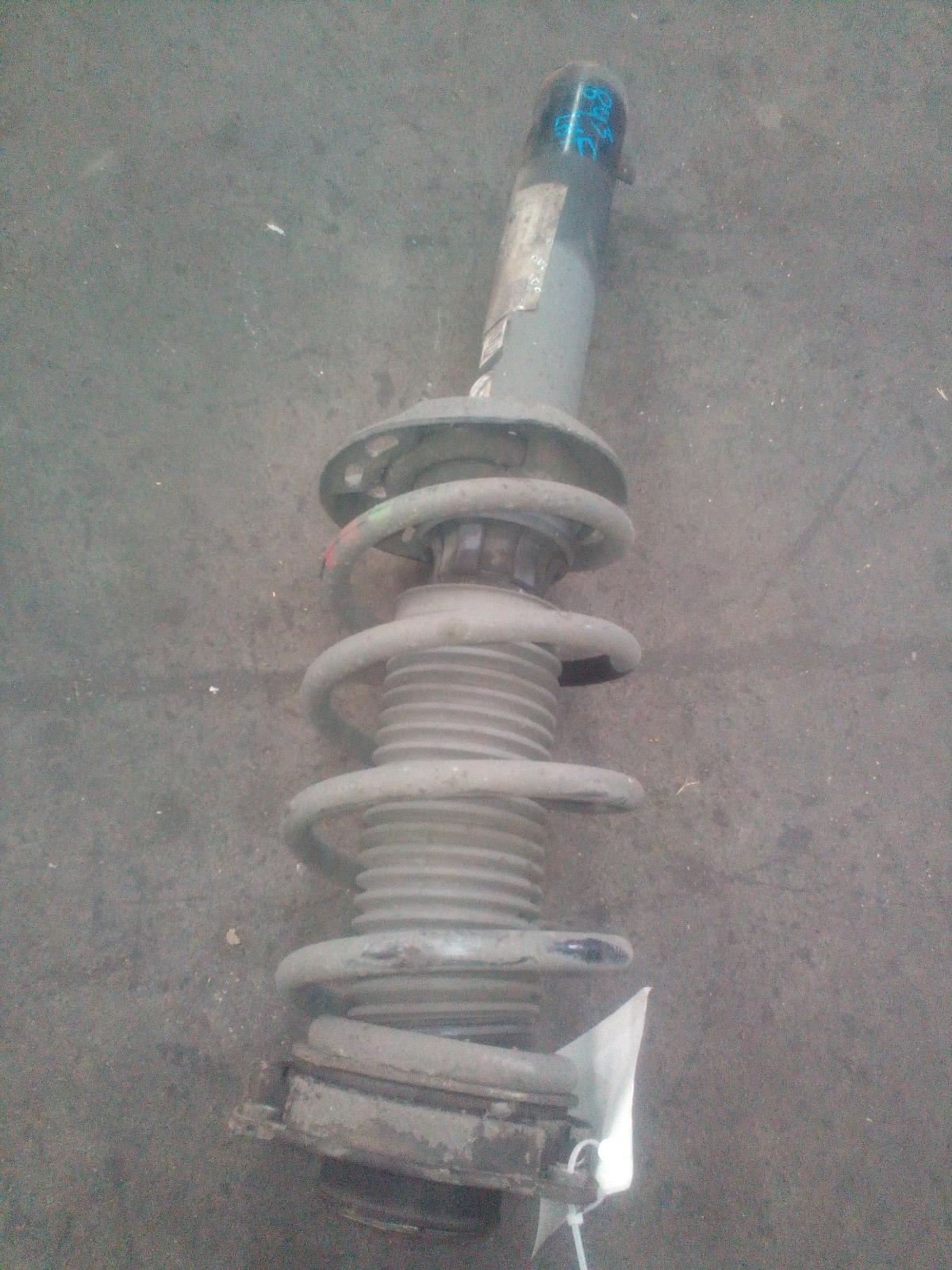 View Auto part Left Front Strut Volkswagen Tiguan 2012